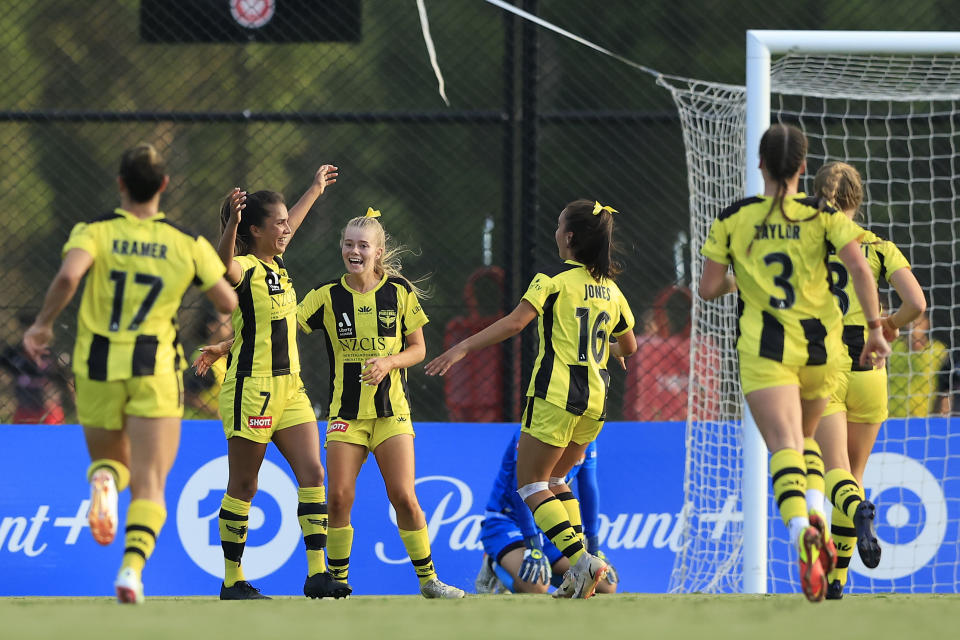 SYDNEY, AUSTRALIA - JANUARY 31:  Chloe Knott of Phoenix celebrates a goal during the round nine A-League Women's match between Perth Glory and Wellington Phoenix at Blacktown Football Park, on January 31, 2022, in Sydney, Australia. (Photo by Mark Evans/Getty Images)