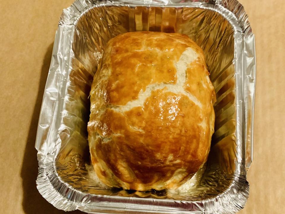 Beef Wellington from Alinea cooked in silver takeout tin