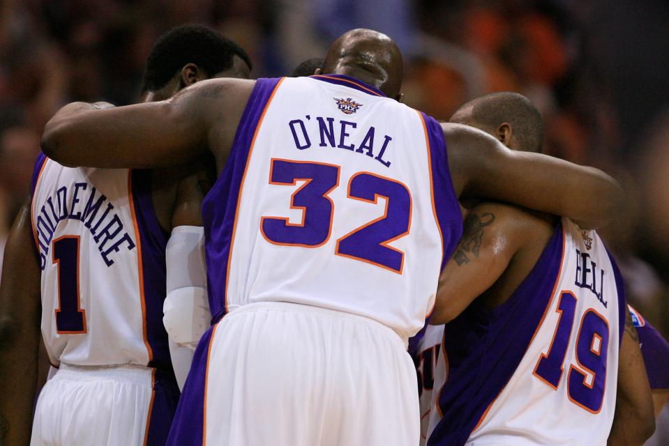 Shaquille O'Neal in the team huddle with then-Suns teammates Raja Bell and Amare Stoudemire before a first-round playoff game in 2008.