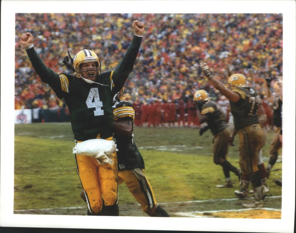 Packers quarterback Brett Favre shows his delight after Edgar Bennett's goal-line fumble was recovered by Antonio Freeman for a touchdown in the third quarter of the January 4 Divisional playoff win against San Francisco. The Packers defeated the 49ers that day, 35-14. January 29, 1997.