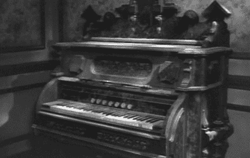 An old piano playing by itself