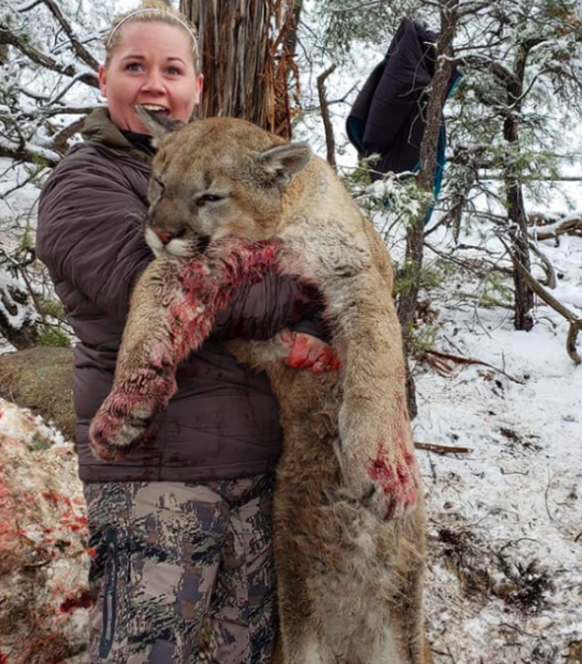 Franchesca Esplin was labelled a ‘sick witch’ online for posting selfies with a dead mountain lion. Source: Facebook/Prairie Protection Colorado