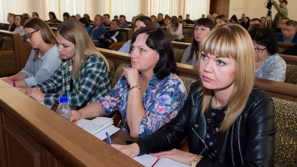 PHOTO: Members of the Luhansk regional election commission listen to a speaker as they plan to hold a referendum in Luhansk People's Republic controlled by Russia-backed separatists, in Luhansk, Ukraine, Sept. 21, 2022.  (AP)