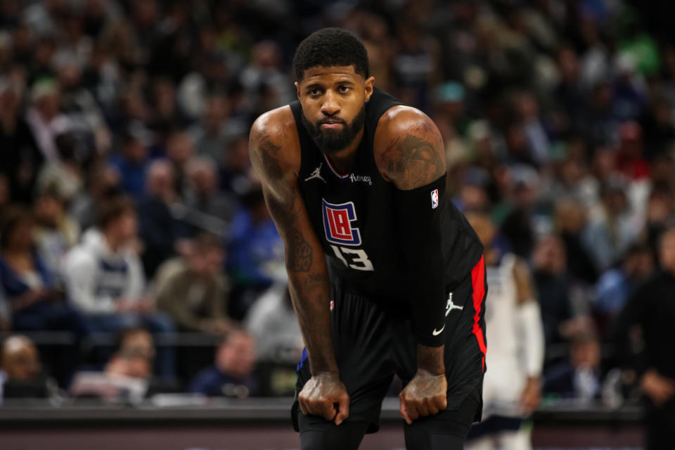 MINNEAPOLIS, MN - APRIL 12: Paul George #13 of the Los Angeles Clippers looks on before shooting free throws against the Minnesota Timberwolves in the third quarter during a Play-In Tournament game at Target Center on April 12, 2022 in Minneapolis, Minnesota. The Timberwolves won 109-104 to advance to the NBA Playoffs. NOTE TO USER: User expressly acknowledges and agrees that, by downloading and or using this Photograph, user is consenting to the terms and conditions of the Getty Images License Agreement. (Photo by David Berding/Getty Images)