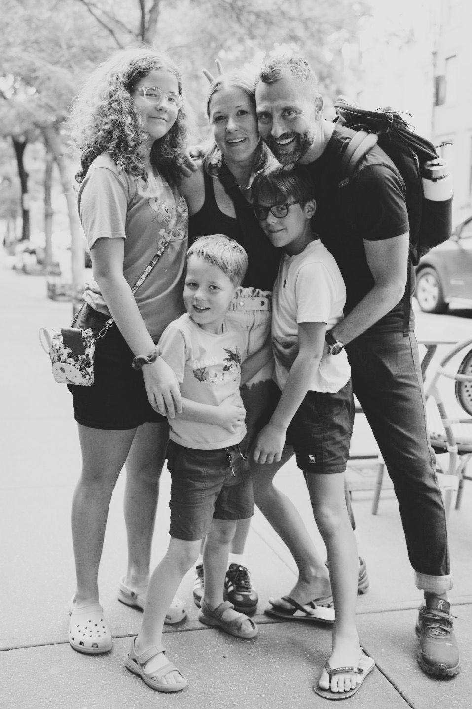 Filko Prugo, right, and his family. He carries the BRCA2 cancer mutation that increases his risk for several cancers, which is why he volunteered to test an experimental cancer vaccine.