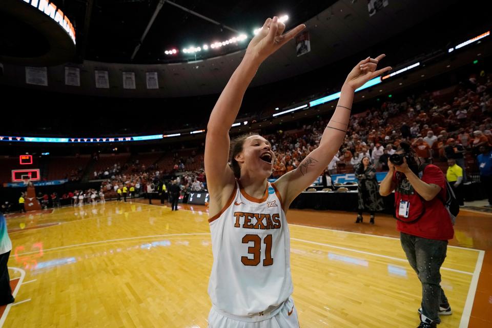 Texas guard Audrey Warren (31) celebrates after the team's win over Fairfield in a college basketball game in the first round of the NCAA women's tournament, Friday, March 18, 2022, in Austin, Texas. (AP Photo/Eric Gay)