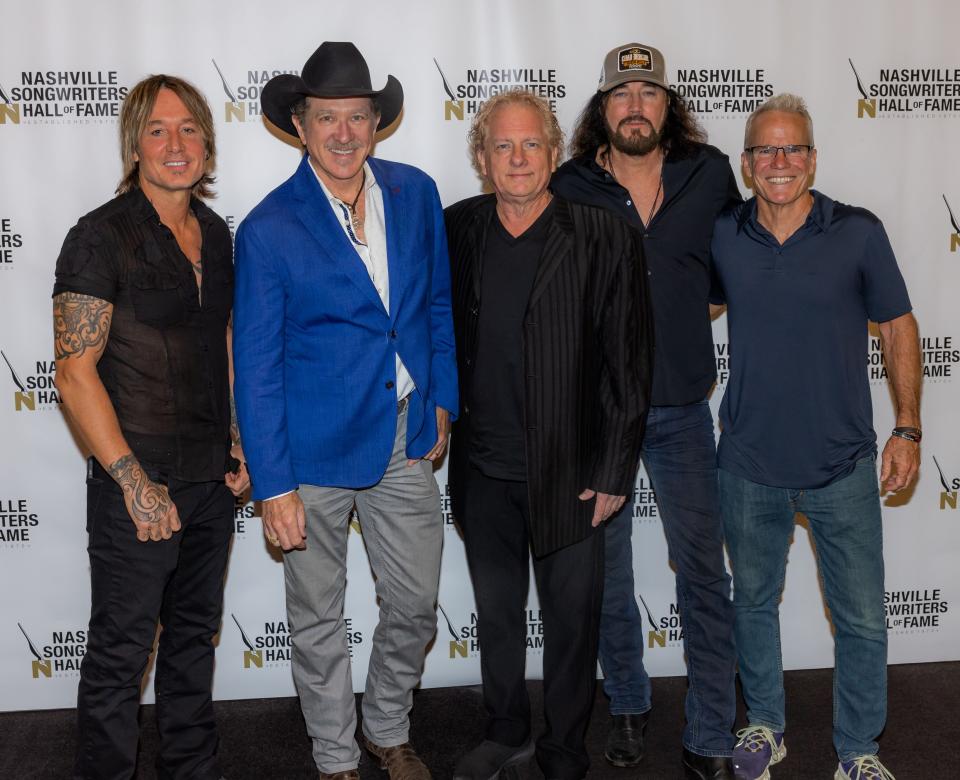 Keith Urban, from left, Kix Brooks, Rafe Van Hoy, David Lee Murphy and Casey Beathard are photographed during an event announcing that they will become the newest members of the Nashville Songwriters Hall of Fame on Aug. 3, 2023.