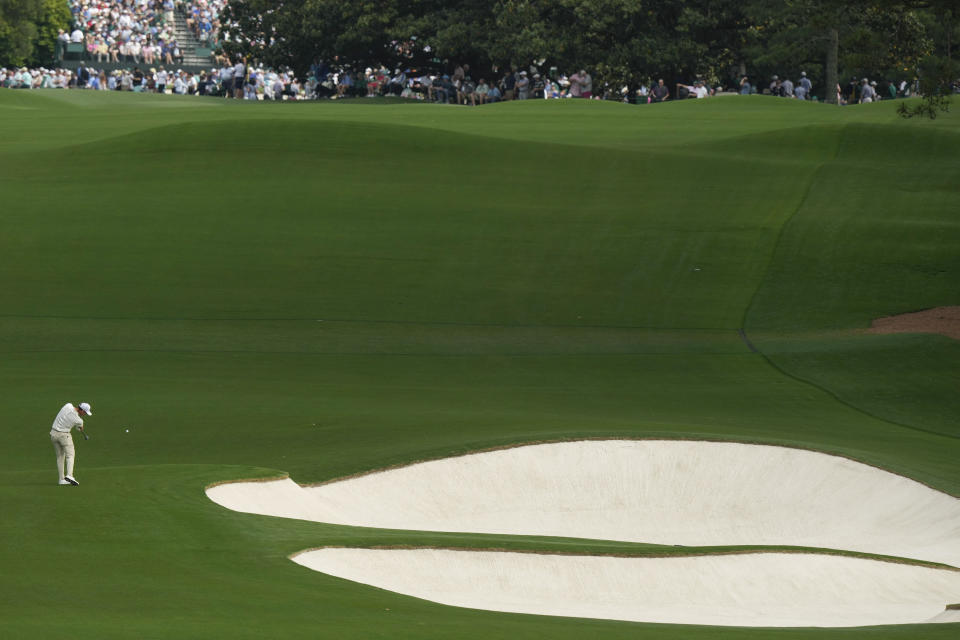 FILE - Danny Willett, of England, hits from the fairway on the eighth hole during the second round of the Masters golf tournament at Augusta National Golf Club on Friday, April 7, 2023, in Augusta, Ga. The hill is so steep the green can't be seen from the fairway. (AP Photo/Charlie Riedel)