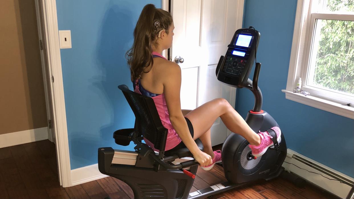  Woman using the Schwinn 270 Recumbent Bike. 