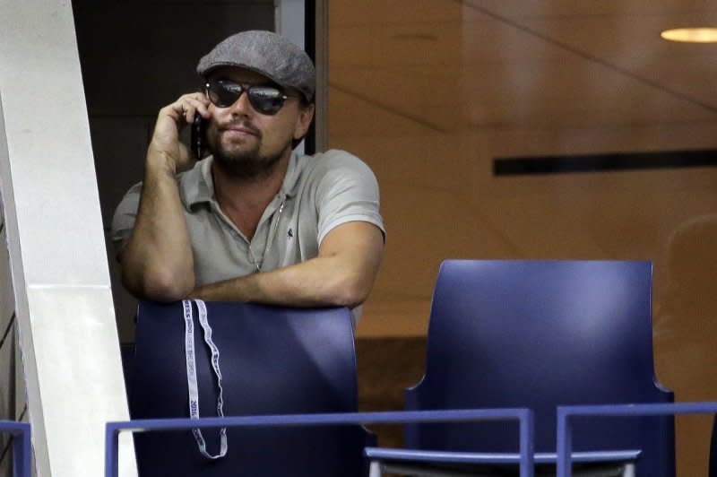Actor Leonardo DiCaprio is on the phone at the 2016 U.S. Open Tennis Championships at the USTA Billie Jean King National Tennis Center in New York City on September 11, 2016. On November 10, 1951, area codes were introduced in the United States, Canada and parts of the Caribbean, allowing direct-dialing of long-distance telephone calls. File Photo by Ray Stubblebine/UPI