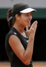 Ana Ivanovic of Serbia celebrates after defeating Elina Svitolina of Ukraine during their women's quarter-final match during the French Open tennis tournament at the Roland Garros stadium in Paris, France, June 2, 2015. REUTERS/Jean-Paul Pelissier