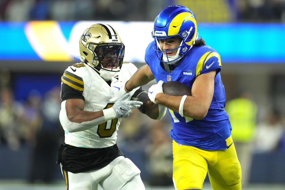 Dec 21, 2023; Inglewood, California, USA; Los Angeles Rams wide receiver <a class="link " href="https://sports.yahoo.com/nfl/players/40168" data-i13n="sec:content-canvas;subsec:anchor_text;elm:context_link" data-ylk="slk:Puka Nacua;sec:content-canvas;subsec:anchor_text;elm:context_link;itc:0">Puka Nacua</a> (17) catches a pass against New Orleans Saints safety <a class="link " href="https://sports.yahoo.com/nfl/players/31964" data-i13n="sec:content-canvas;subsec:anchor_text;elm:context_link" data-ylk="slk:Ugo Amadi;sec:content-canvas;subsec:anchor_text;elm:context_link;itc:0">Ugo Amadi</a> (0) in the second half at SoFi Stadium. Mandatory Credit: Kirby Lee-USA TODAY Sports