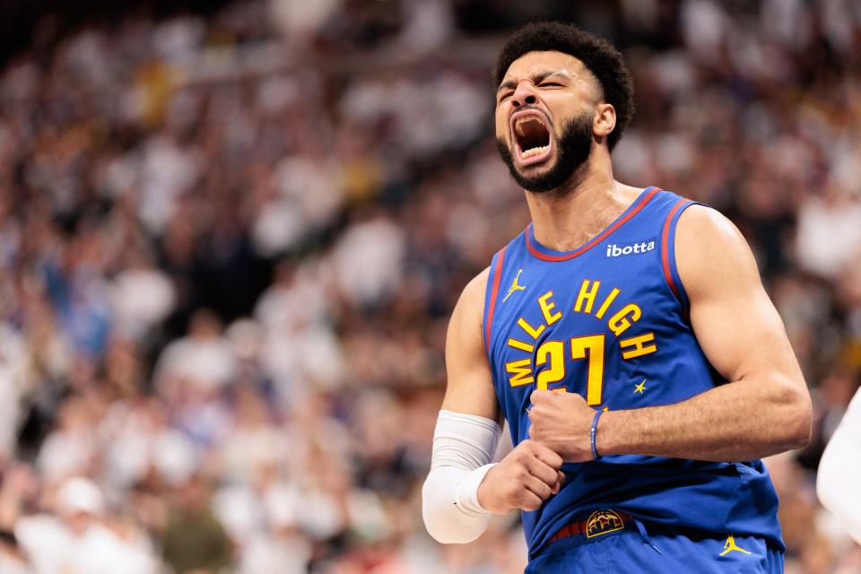 Denver Nuggets guard Jamal Murray celebrates after a dunk in the first quarter against the Los Angeles Lakers.