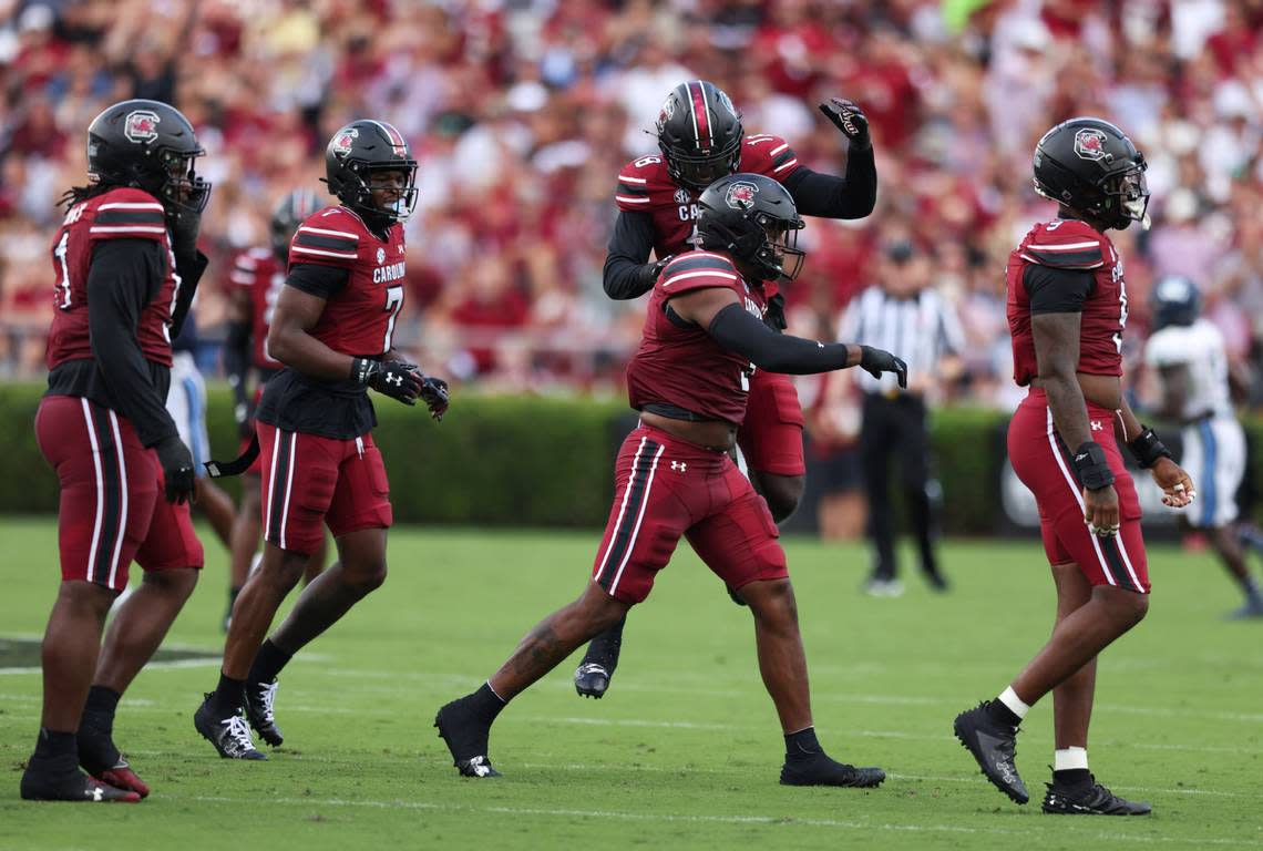 South Carolina edge Kyle Kennard (5) is congratulated after a sack during the first half of the Gamecocks’ season opener against Old Dominion in Columbia on Saturday, August 31, 2024.