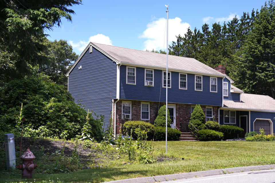 FILE - An empty flagpole is seen outside the residence where the body of John O'Keefe, a Boston police officer, was found on Jan. 29, 2022, outside the home, Thursday, June 27, 2024, in Canton, Mass. A judge declared a mistrial Monday, July 1, 2024, after jurors deadlocked in the case of Karen Read, who was accused of killing her boyfriend, O'Keefe, by striking him with her SUV and leaving him in a snowstorm. Prosecutors said in a statement that they intend to retry the case. (AP Photo/Charles Krupa, File)