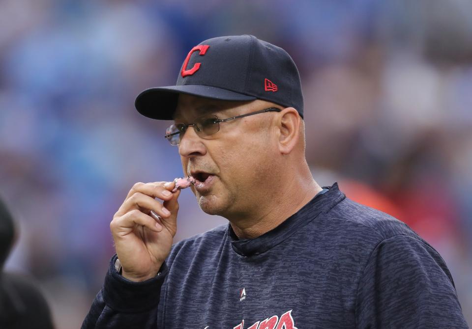 TORONTO, ON - SEPTEMBER 8: Manager Terry Francona #77 of the Cleveland Indians returns to the dugout after making a pitching change in the sixth inning during MLB game action against the Toronto Blue Jays at Rogers Centre on September 8, 2018 in Toronto, Canada. (Photo by Tom Szczerbowski/Getty Images)
