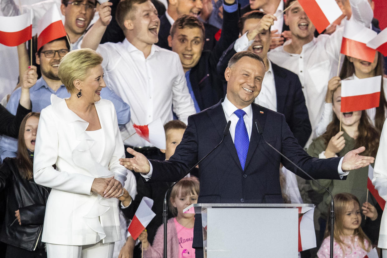 Polish President Andrzej Duda and his wife, Agata Kornhauser Duda, celebrate with supporters the following initial election results during Poland's presidential elections runoff, July 12, 2020 in Pultusk, Poland. / Credit: Getty