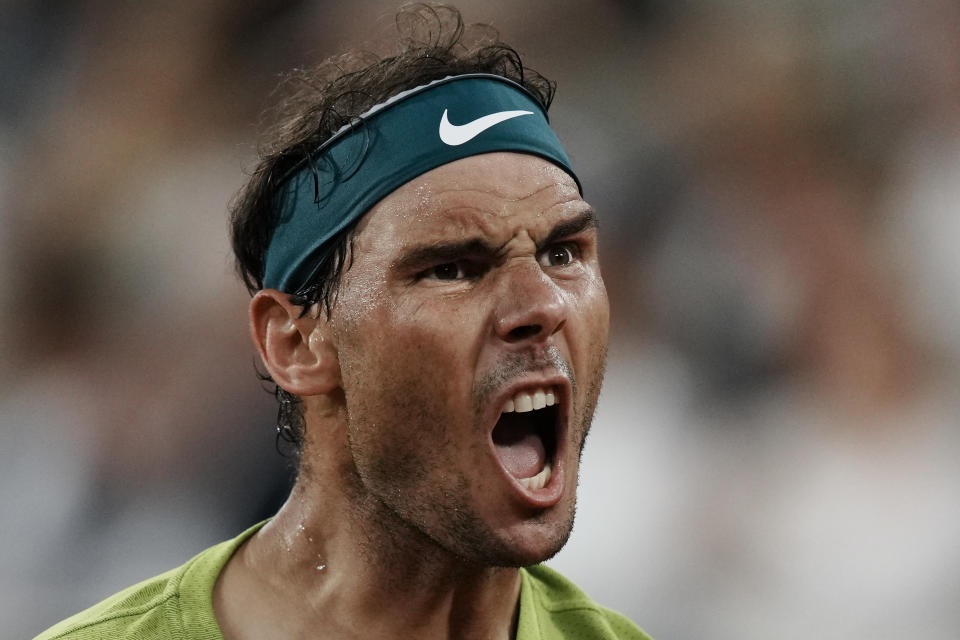 FILE -Spain's Rafael Nadal celebrates winning the first set against Germany's Alexander Zverev during their semifinal match at the French Open tennis tournament in Roland Garros stadium in Paris, France, Friday, June 3, 2022. Rafael Nadal is in the French Open field, after all, and the 14-time champion was set up for a challenging first-round matchup in Thursday’s, May 23, 2024, draw against Alexander Zverev. (AP Photo/Thibault Camus, File)