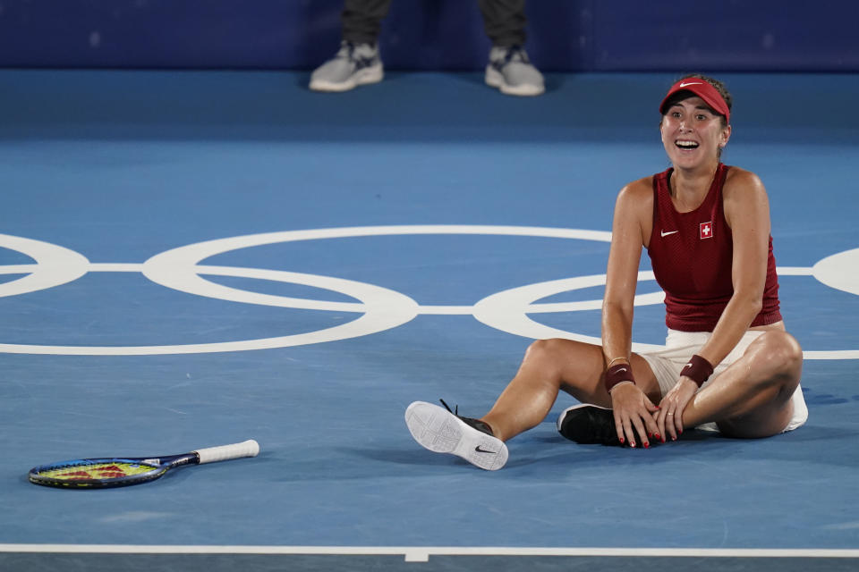 Belinda Bencic, of Switzerland, reacts after defeating Marketa Vondrousova, of the Czech Republic, in the women's gold medal match of the tennis competition at the 2020 Summer Olympics, Saturday, July 31, 2021, in Tokyo, Japan. (AP Photo/Seth Wenig)