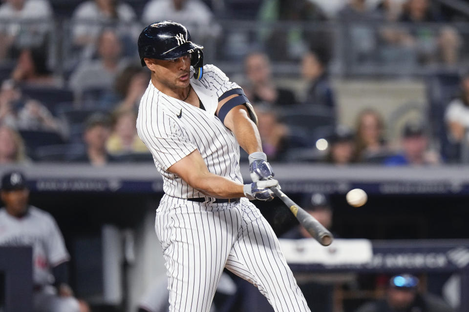 New York Yankees' Giancarlo Stanton hits a home run against the Minnesota Twins during the sixth inning of a baseball game Friday, April 14, 2023, in New York. (AP Photo/Frank Franklin II)