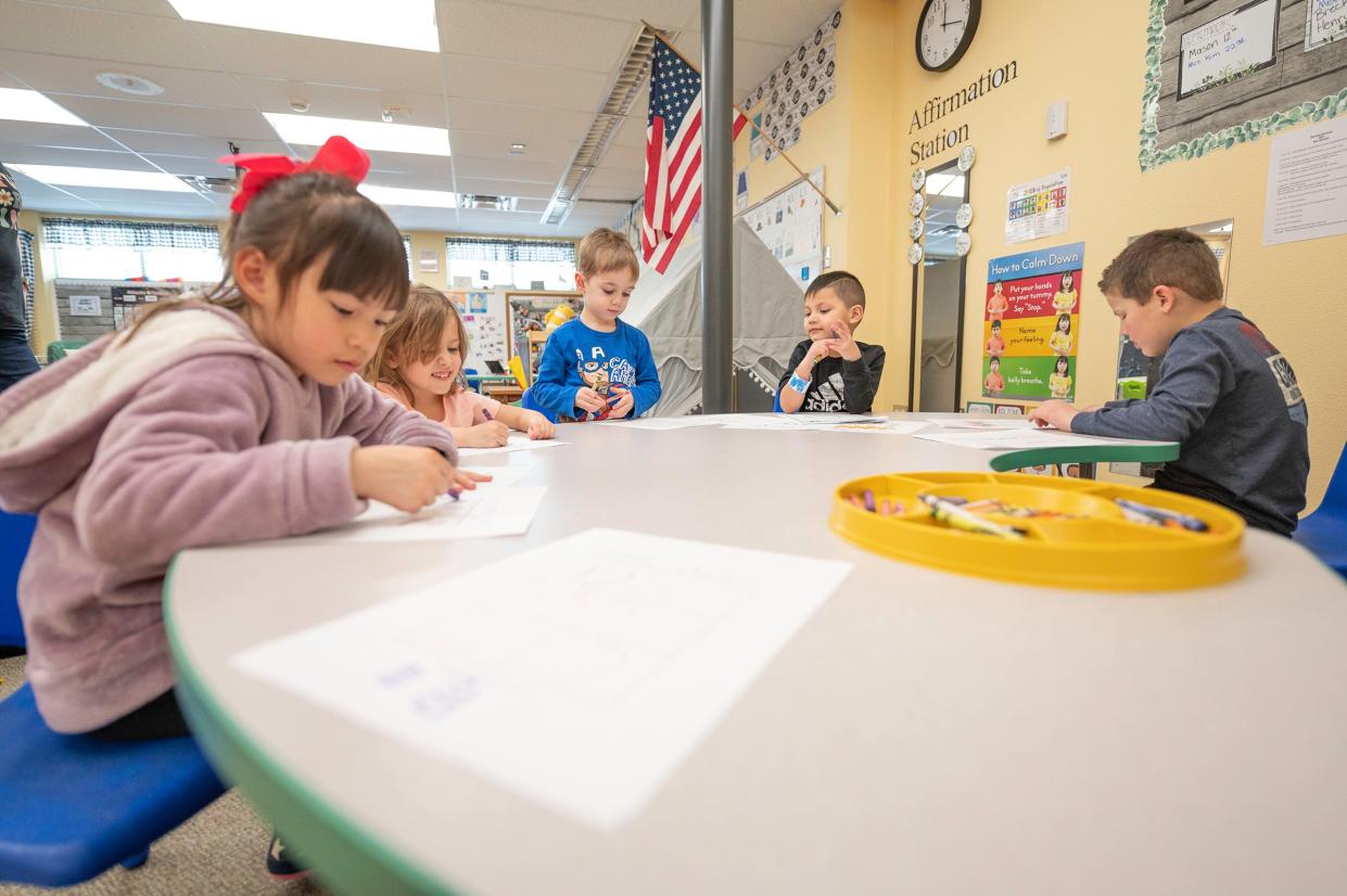 Preschool students fill out worksheets during their class at Vineland Elementary School on Tuesday.