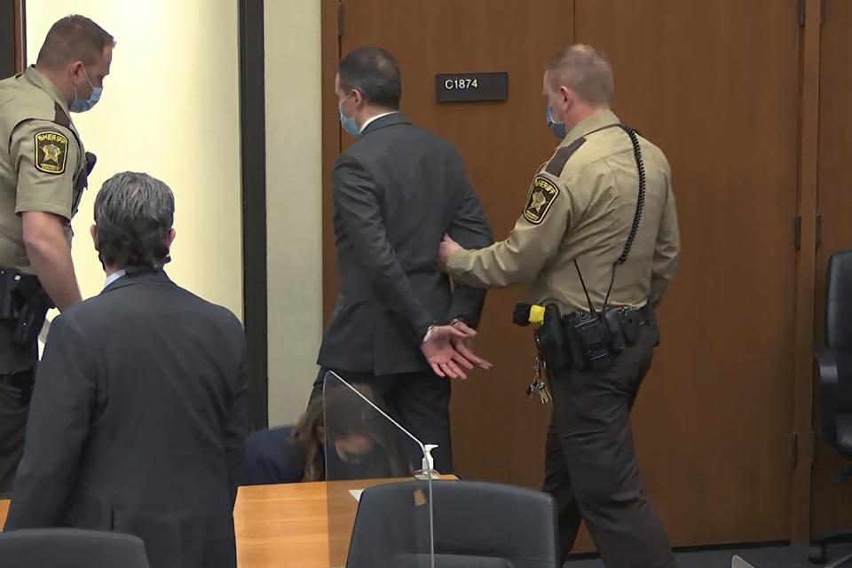 FILE - In this April 20, 2021, file photo, from video, former Minneapolis police officer Derek Chauvin is taken into custody as his attorney Eric Nelson, left, watches, after his bail was revoked after he was found guilty on all three counts in his trial for the 2020 death of George Floyd, Tuesday,, in Minneapolis. Former Minneapolis police Officer Derek Chauvin faces decades in prison when he is sentenced Friday, June 25, 2021, following his murder and manslaughter convictions in the death of George Floyd. Floyd's death, filmed by a teenage bystander as Chauvin pinned Floyd to the pavement for about 9 and a half minutes and ignored Floyd's "I can't breathe" cries until he eventually grew still, reignited a movement against racial injustice that swiftly spread around the world and continues to reverberate. (Court TV via AP, Pool, File)