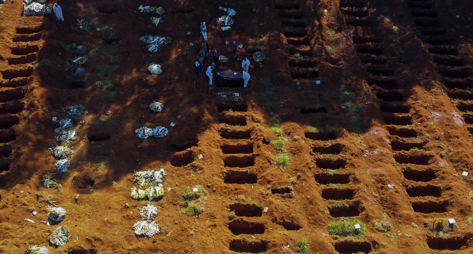 An aerial view of a burial at the Vila Formosa cemetery during the COVID-19 coronavirus pandemic, in Sao Paulo on Sunday. Source: Getty