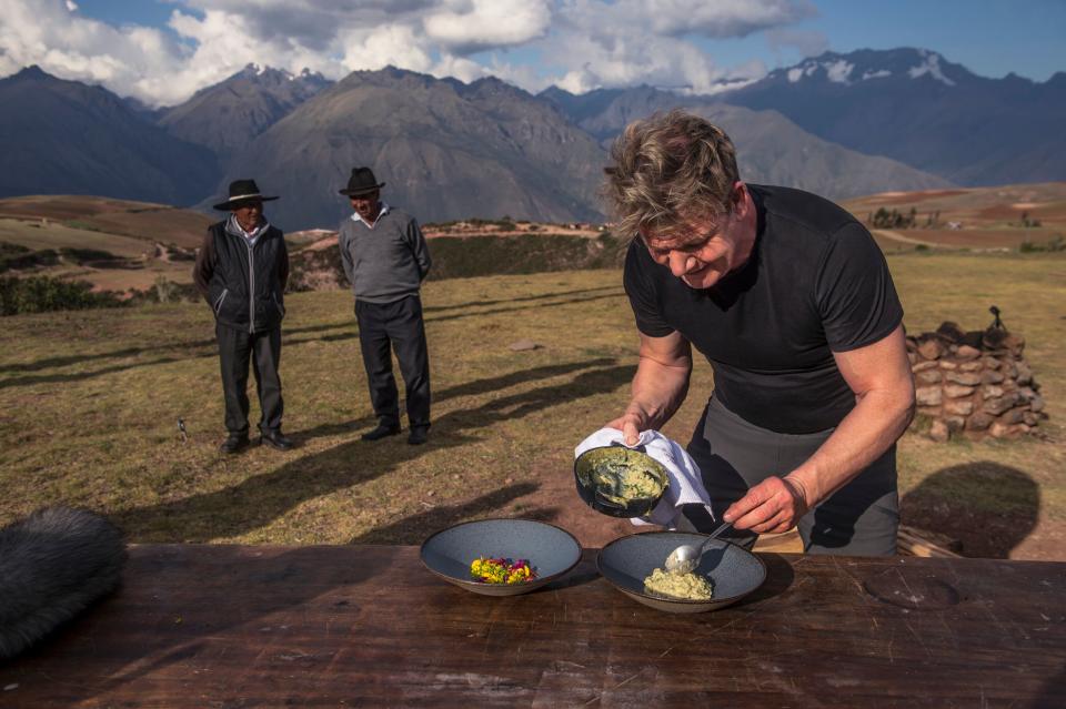 Gordon Ramsay (R) prepares a feast for locals in Peru's Sacred Valley on Gordon Ramsay Uncharted (National Geographic/Ernesto Benavides)