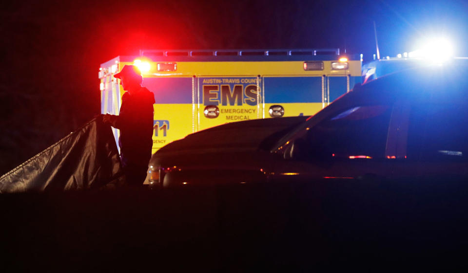 <p>Officials work at the scene where the suspect in a spate of bombing attacks that have terrorized Austin over the past month blew himself up with an explosive device as authorities closed in, the police said early Wednesday, March 21, 2018. (Photo: Eric Gay/AP) </p>