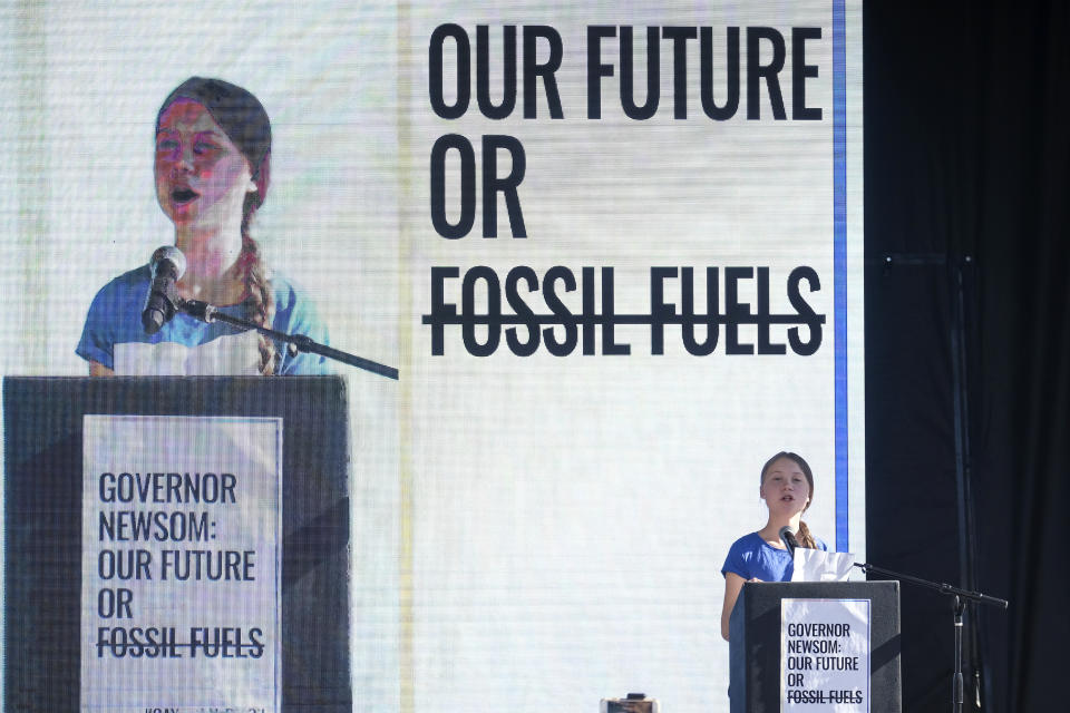 -FILE- In this Friday, Nov. 1, 2019, image climate activist Greta Thunberg speaks after a climate change march in Los Angeles. Thunberg, joint winner of the 2019 Children's Peace Prize with Divina Maloum of Cameroon did not attend the award ceremony in The Hague, Netherlands, Wednesday, Nov. 20, 2019. (AP Photo/Ringo H.W. Chiu, File)