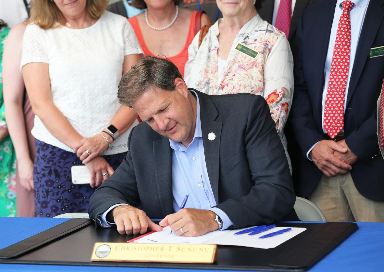 Gov. Chris Sununu signs SB 459 at Frisbie Memorial Hospital in Rochester Friday, July 22, 2022. The new law is designed to be the start of a health-care facility workplace violence prevention program.