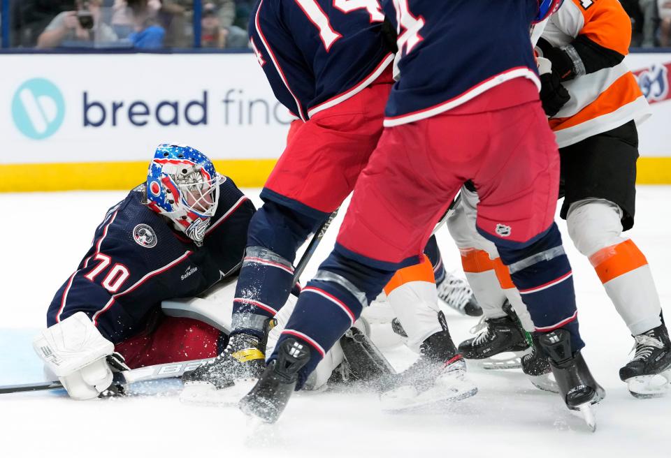 Nov 10, 2022; Columbus, Ohio, USA; Columbus Blue Jackets goaltender Joonas Korpisalo (70) makes a save  against Philadelphia Flyers during the second period of their NHL game at Nationwide Arena. 