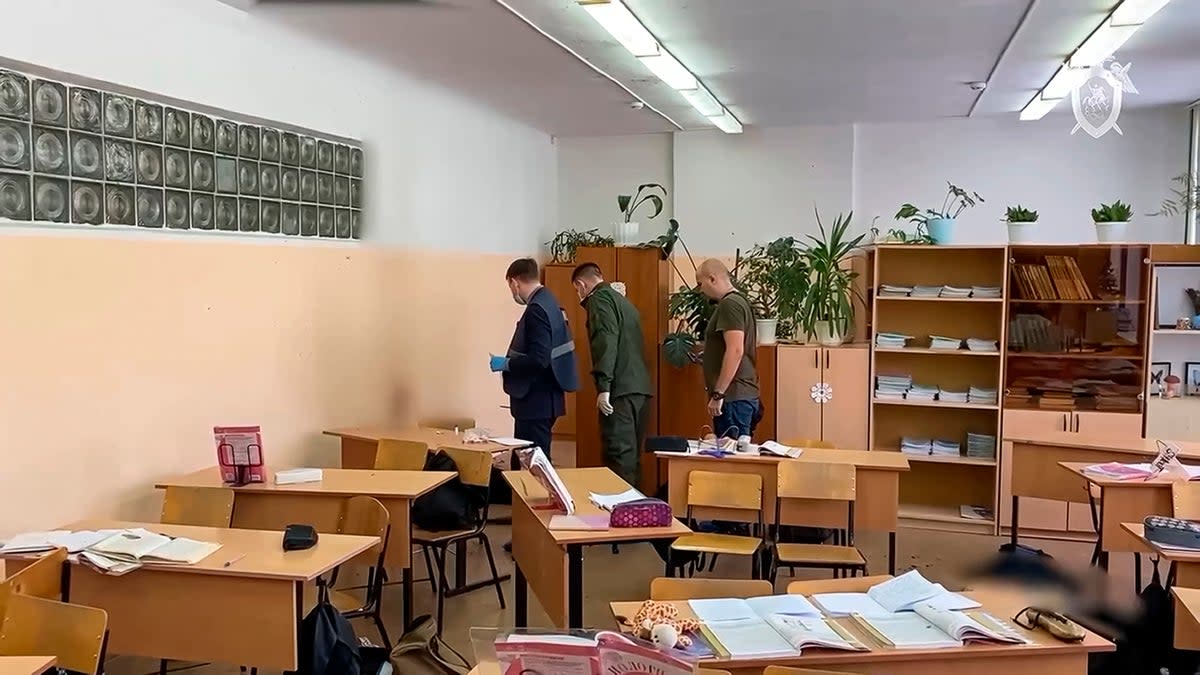 Investigators work at the scene of a shooting by Alina Afanaskina in a classroom of a school in Bryansk, Russia, in December (Russian Investigative Committee)