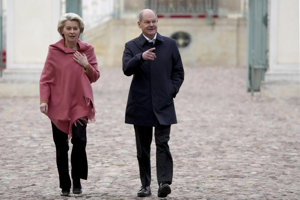 German Chancellor Olaf Scholz, right, and European Commission President Ursula von der Leyen, left, arrive for a press conference as part of a two-day closed meeting of the German government at Meseberg palace in Gransee near Berlin, Germany, Sunday, March 5, 2023. (AP Photo/Michael Sohn)