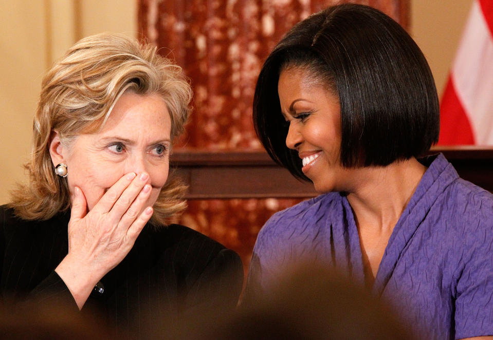 Hillary Rodham Clinton chats with first lady Michelle Obama