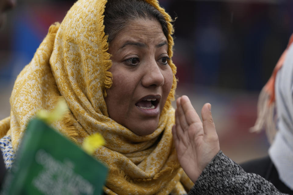 A supporter of Pakistan's former Prime Minister Imran Khan weeps as she reacts following a special court decision, outside the Adiyala prison, in Rawalpindi, Pakistan, Tuesday, Jan. 30, 2024. A Pakistani court on Tuesday sentenced former Prime Minister Khan and one of his party deputy Qureshi to 10 years in prison each, after finding them guilty of revealing official secrets. (AP Photo/Anjum Naveed)