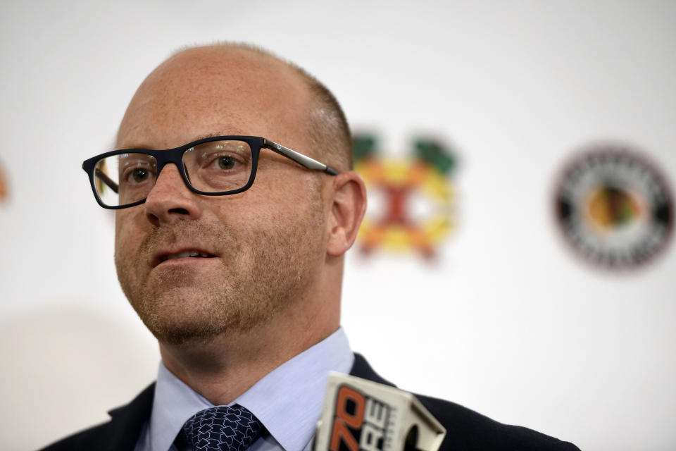 FILE - In this July 27, 2018, file photo, Chicago Blackhawks general manager Stan Bowman speaks to the media during the NHL hockey team's convention in Chicago. The Blackhawks are holding a briefing Tuesday, Oct. 26, 2021, to discuss the findings of an investigation into allegations that an assistant coach sexually assaulted a player in 2010. The Blackhawks pledged to release the findings of the investigation, which Bowman, former Chicago coach Joel Quenneville and others who were in the organization at the time agreed to cooperate with. (AP Photo/Annie Rice, File)