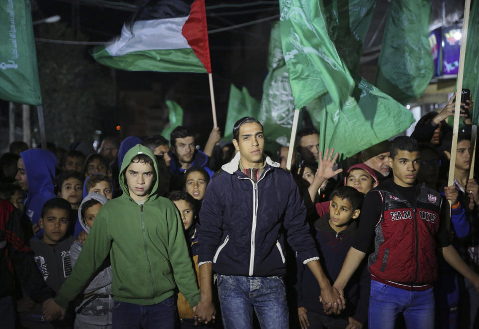 <p>Hamas supporters wave their green flags during a protest against the possible U.S. decision to recognize Jerusalem as Israel’s capital, in Jebaliya Refugee Camp, Gaza Strip, Wednesday, Dec. 6, 2017. (Photo: Adel Hana/AP) </p>