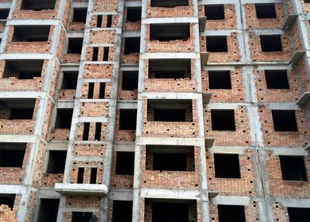 A building under construction is seen in Yulin, Shaanxi province, China, June 21, 2016. REUTERS/Sue-Lin Wong