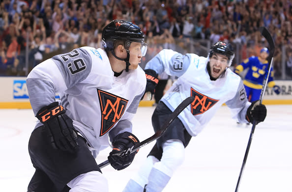 TORONTO, ON - SEPTEMBER 21: Nathan MacKinnon #29 celebrates with Shayne Gostisbehere #53 of Team North America after scoring an overtime goal on Team Sweden during the World Cup of Hockey 2016 at Air Canada Centre on September 21, 2016 in Toronto, Ontario, Canada. (Photo by Vaughn Ridley/World Cup of Hockey via Getty Images)