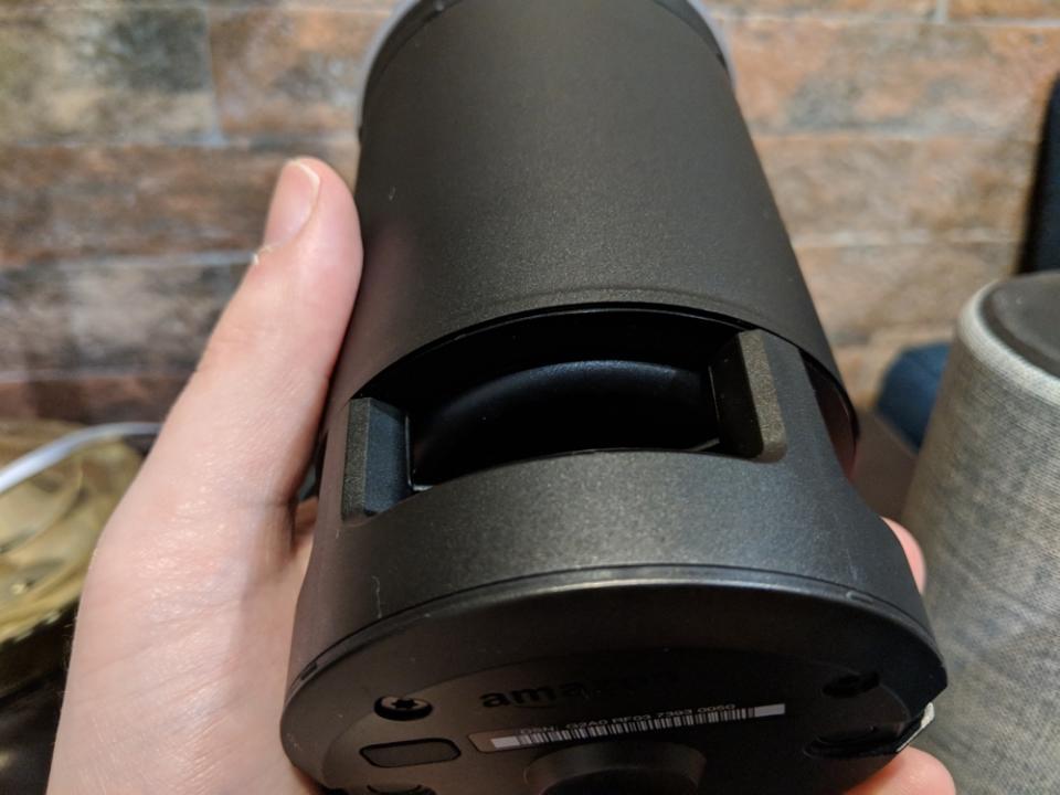 The Amazon Echo without its fabric shell.