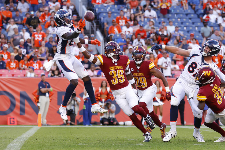 Brandon Johnson secured the Hail Mary, but a failed two-point conversion sealed Denver's fate. (Justin Edmonds/Getty Images)