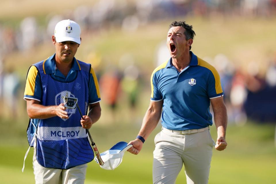 McIlroy celebrates his shot to the 17th green (PA)