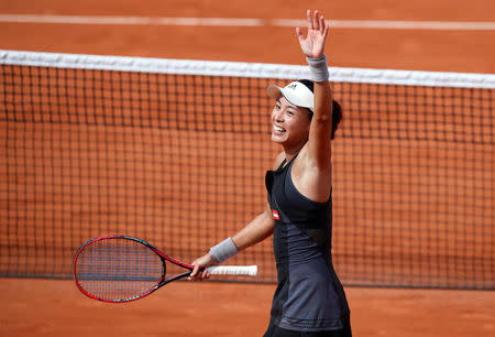 Tennis - French Open - Roland Garros, Paris, France - May 27, 2018 China's Qiang Wang celebrates after winning her first round match against Venus Williams of the U.S. REUTERS/Christian Hartmann