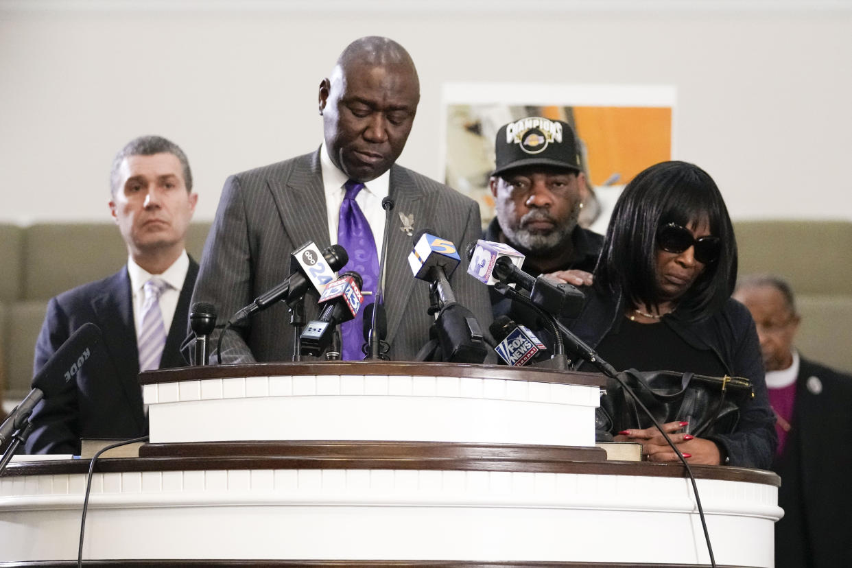 Civil rights attorney Ben Crump speaks at a news conference with the family of Tyre Nichols, who died after being beaten by Memphis police officers, as RowVaughn Wells, mother of Tyre, right, and Tyre's stepfather Rodney Wells, along with attorney Tony Romanucci, left, also stand with Crump, in Memphis, Tenn., Monday, Jan. 23, 2023. (AP Photo/Gerald Herbert)