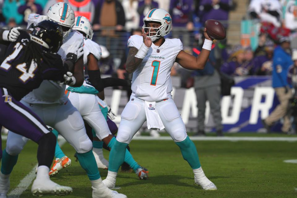 Dec 31, 2023; Baltimore, Maryland, USA; Miami Dolphins quarterback Tua Tagovailoa (1) looks to pass against the Baltimore Ravens in the second quarter at M&T Bank Stadium. Mandatory Credit: Mitch Stringer-USA TODAY Sports