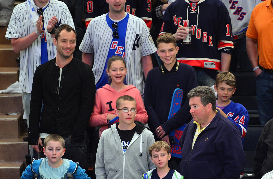 Jude Law, Iris Law, Finlay Law and Rudy Law attend the Ottawa Senators vs New York Rangers game at Madison Square Garden on April 14, 2012 in New York City.  (Photo by James Devaney/FilmMagic)