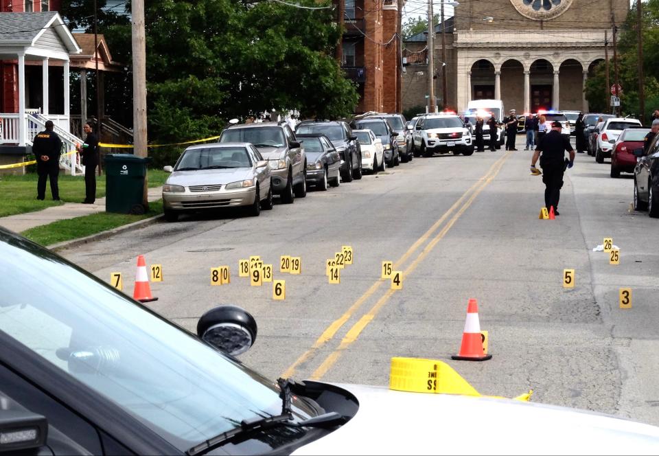 Police investigate after 16-year-old Javier Randolph was gunned down just a few blocks from Walnut Hills High School on Oct. 13, 2021.