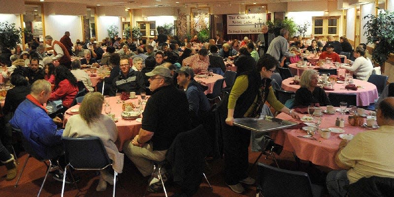 A scene from a past Community Thanksgiving Dinner held at The Church of St. Luke in Stroudsburg at the Joseph Jacques Center. The church has been holding the free dinner for over 25 years.
