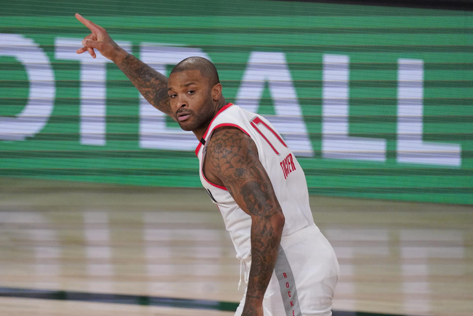 Houston Rockets' P.J. Tucker (17) reacts during the first half of an NBA conference semifinal playoff basketball game against the Los Angeles Lakers Friday, Sept. 4, 2020, in Lake Buena Vista, Fla. (AP Photo/Mark J. Terrill)